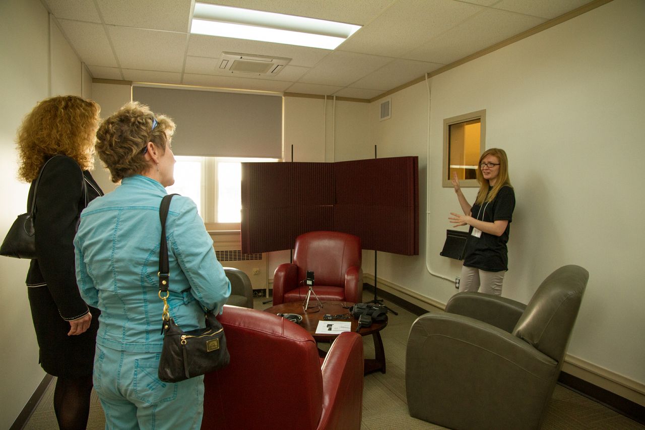 Researcher Allison Penner gives a tour of the Oral History Centre's new Interview space.