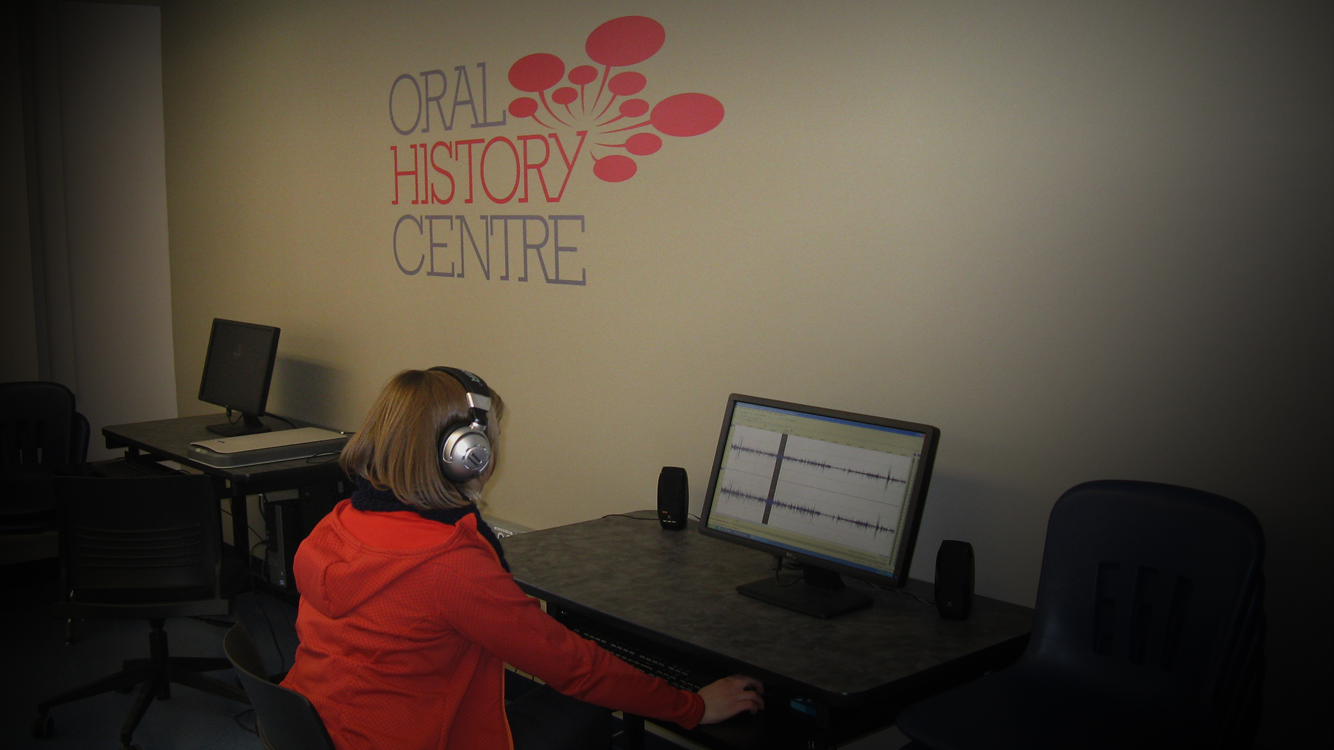 Back of student sound editing at Oral History Centre lab workstation.